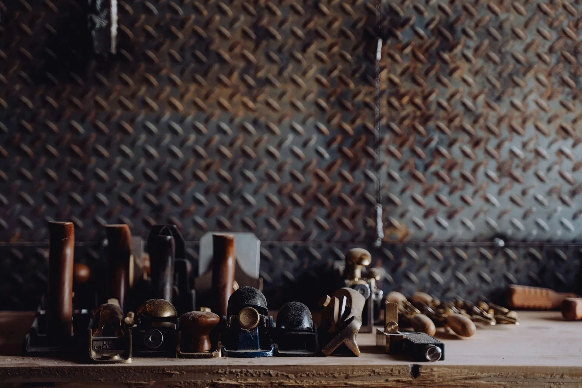 Custom woodworking tools and craftsmanship featured on the Against the Grain Woodworks website.