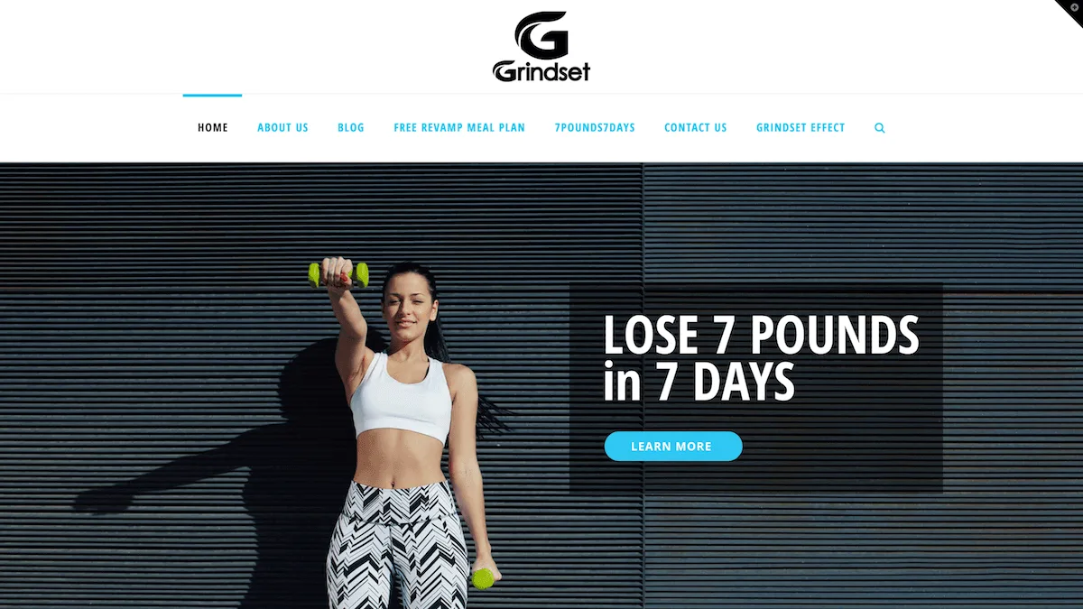 Grindset Fitness website featuring coaching programs and brand philosophy.