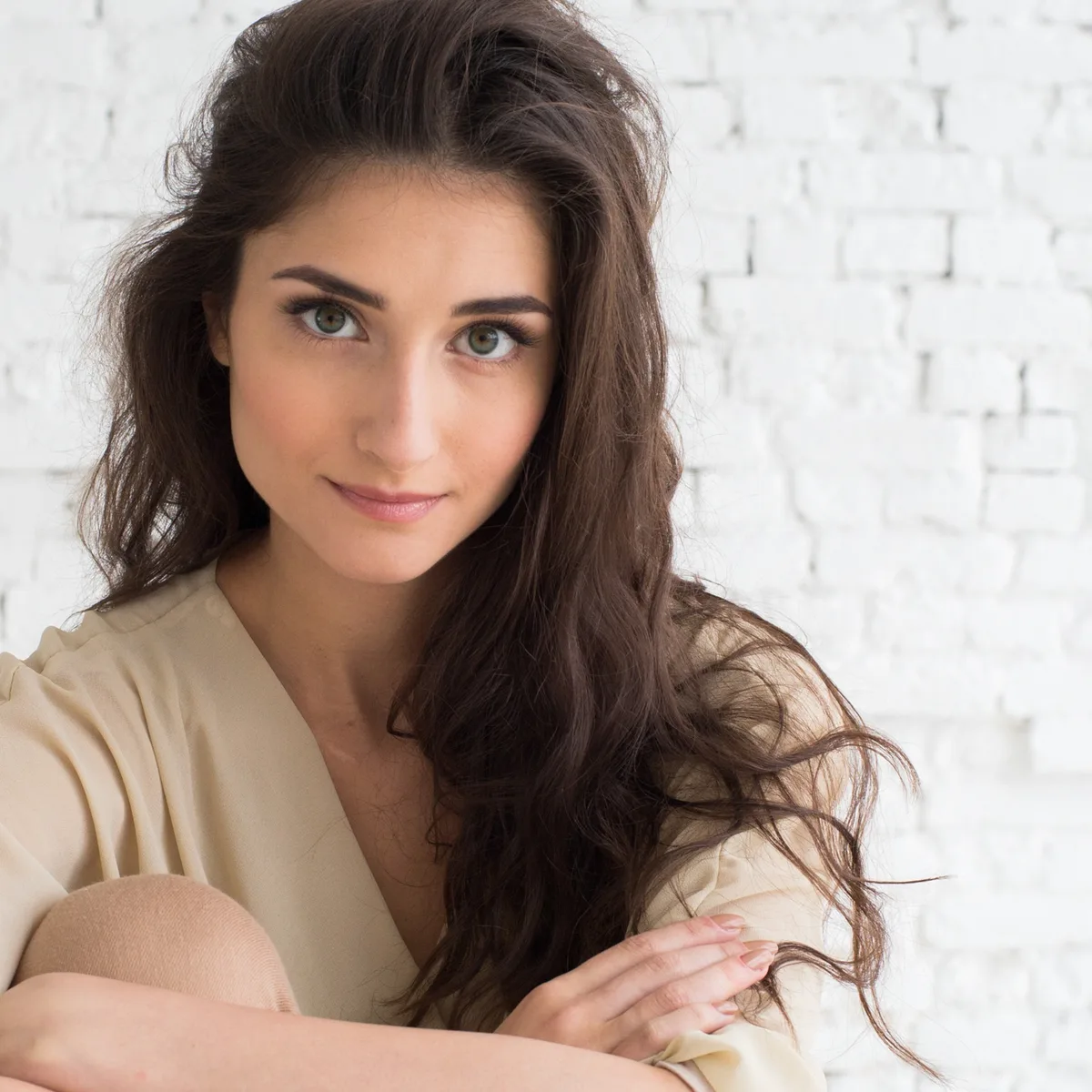 Portrait of a woman with natural makeup used in the BeautyMark brand visuals.